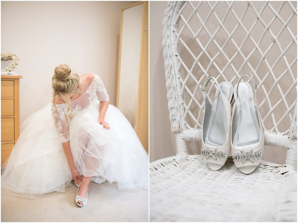 bride putting on her wedding shoes