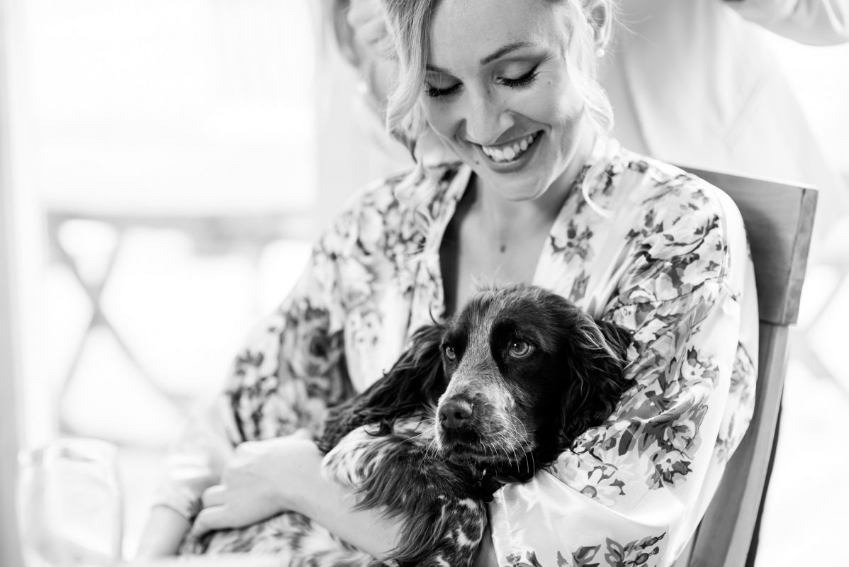 Bride and dog on wedding day